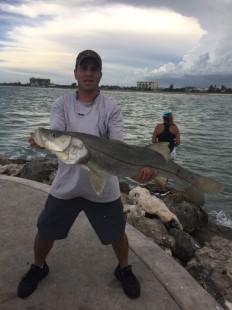 George DiMartino with a Fort Pierce jetty snook. Photo credit: Capt. Joe Ward.