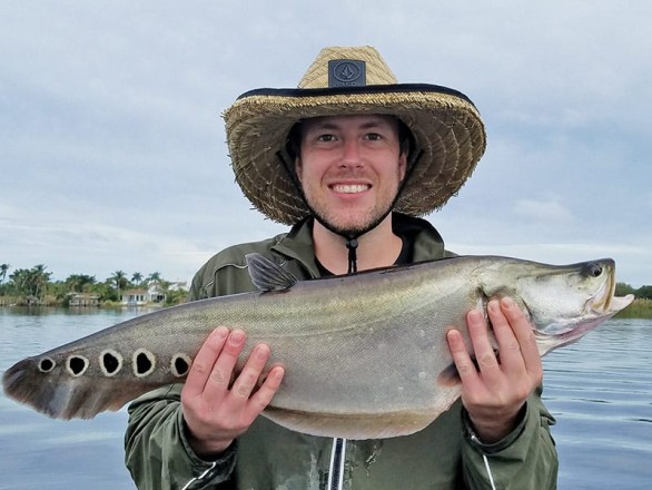 USMC Kevin caught his first clown knife fish with Capt. Neal Stark