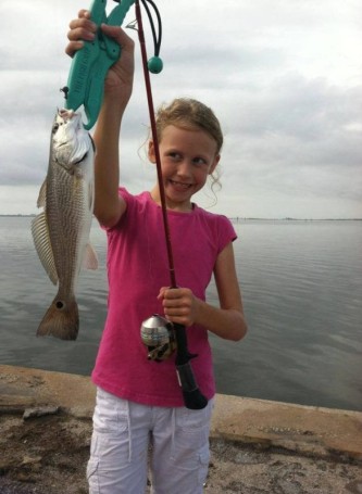 Madison Ellis with her first redfish