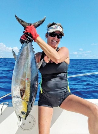 Betty Moore caught this big blackfin while kite fishing with live goggle eyes.