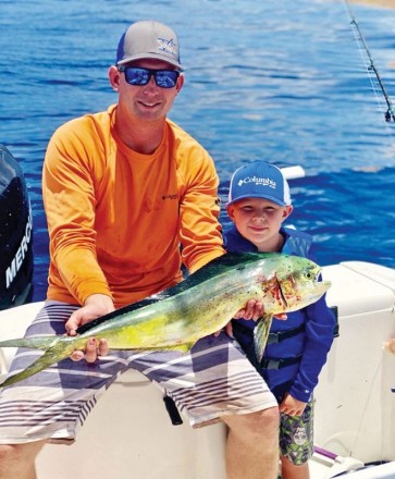 Five year old Zander Humphrey caught 
this schoolie while fishing with his dad Zack. Special thanks to Zack for his service 
in the United States Coast Guard.