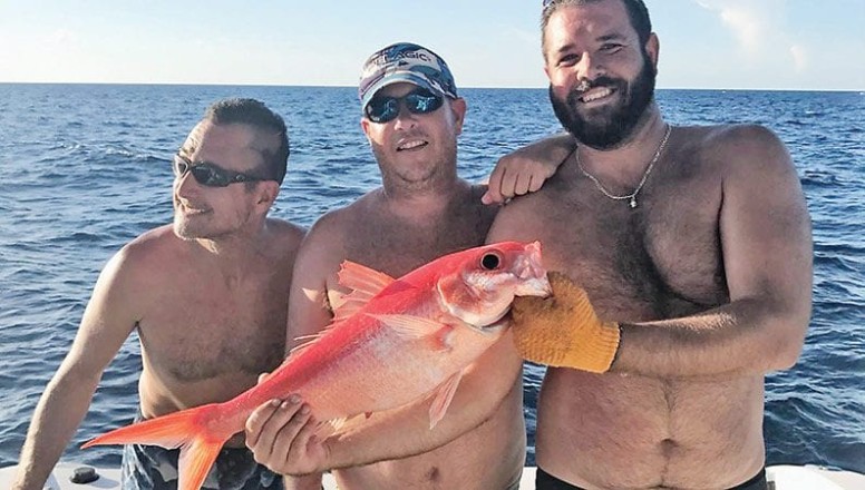 Lee, Eric and Brian caught a memory off South Bimini with this queen snapper