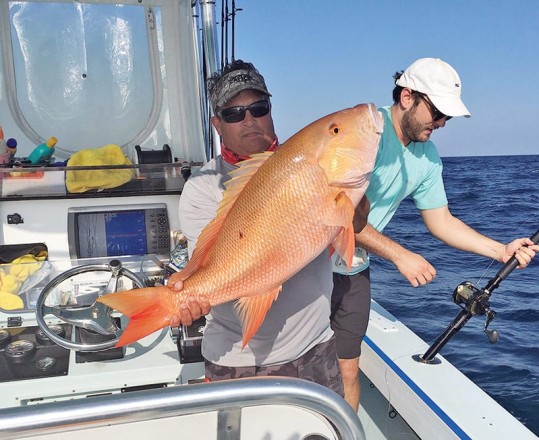 Capt. Orly with a stud mutton snapper.