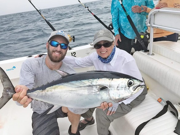 A lit up blackfin tuna caught aboard Bouncer's Dusky 33.