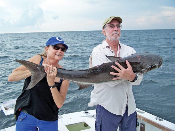 Aleta and Alex Cortinas with a cobia caught at Marker 7 aboard Natural World Charters