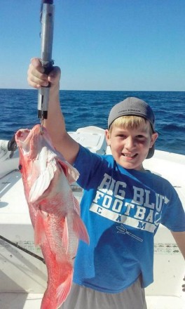 Bryson McJunkin snapper fishing with Dad and Capt. Jason