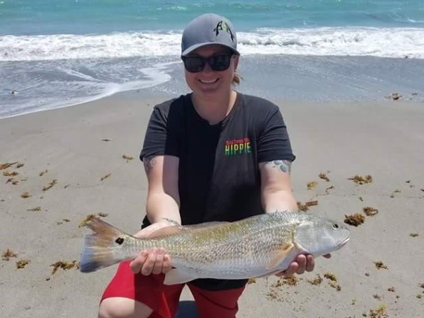 Shannon Cole caught this 23 12 inch beautiful Redfish awesome coloring on the tail! She's just getting into fishing and she's hooked!