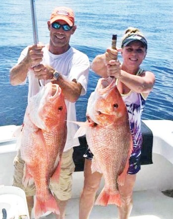 Mike & Stephanie Hobbs of PC with some big red snapper