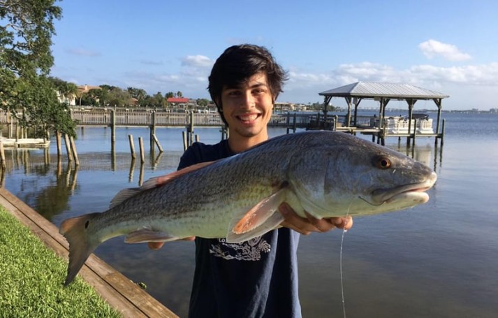 Alex with a nice red caught on the flats on the east side of the Indian river between the Eau Gallie and Melbourne causeways.