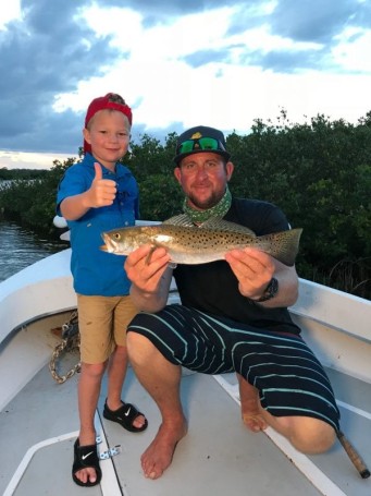 Bryson of Smacked TV with a Nice Trout while fishing with the Native Eyewear Team & Yellow Dawg Fishing