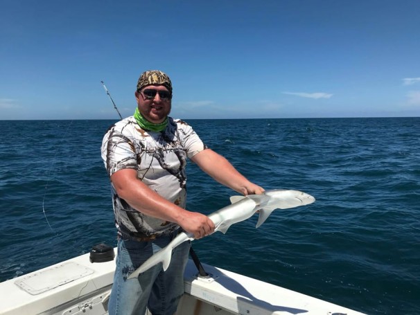 Adam Cottrill  visiting from WV went fishing with Capt Gary with Hooked on a Feeling charters. This is Adams very first Shark (sharpnose).
