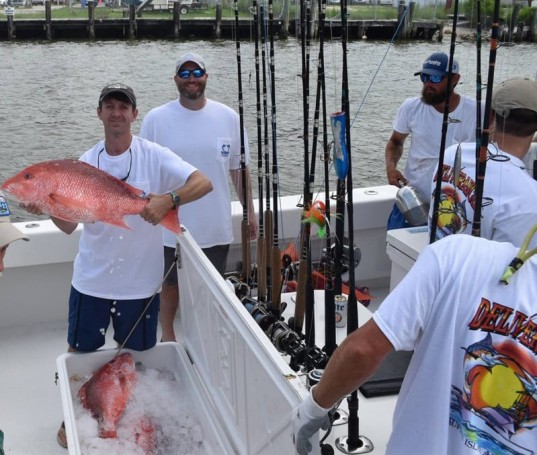 Team Deliverance showing off heir catch of Red Snapper at the Alabama Deep Sea Fishing Rodeo.