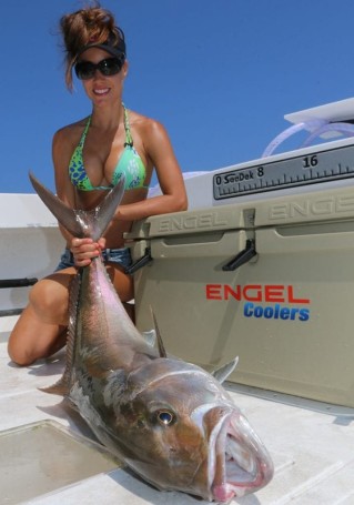 Luiza shows off a nice Amberjack. For more information on this amazing lady angler, go to: www.fishingwithluiza.com