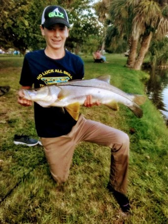 Kai with his first over slot snook