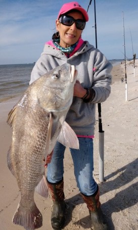 Colleen Rhyde, from upstate NY, Caught this 30 lb. Redfish in mid-December at Fort Morgan.