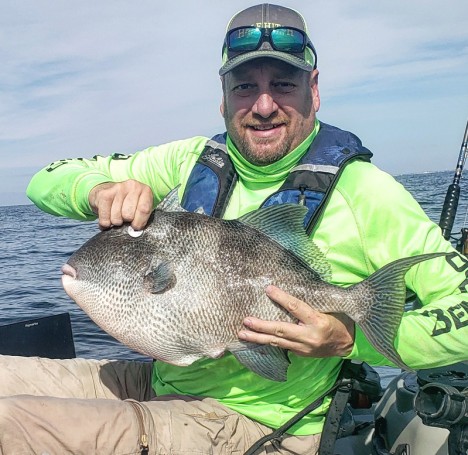 Barrett Fine with a 10.3 lb. triggerfish caught off Navarre, FL.