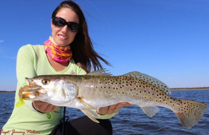 Luiza shows off a nice Speckled Trout. For more information on this amazing lady angler, go to: www.fishingwithluiza.com