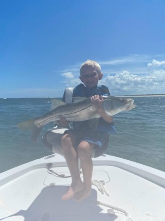 He Catches Bigger Fish Than His Dad