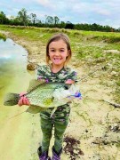 Jensen (age 7) caught a stud crappie on a DIY fly lure that she tied herself!