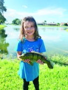 6 year old Stella, caught her first  peacock on a Storm WildEye Shad lure from her backyard lake in West Boca.