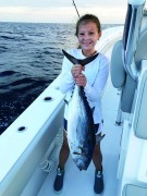 Braxton Humphreys picks up an early morning bonito while fishing her first tournament with her dad.