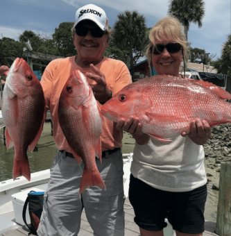 Jim and Nikki Thorsen with Red Snappers caught 20 miles out of Ponce Inlet, 1st day of season