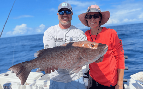 Diane Pressley with a “Mogan” Mangrove Snapper over 11lbs. out of Ponce Inlet