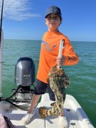 Jax with a goliath grouper on a trip to Chokoloskee.