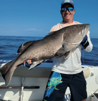 Brandon Lipps with a monster 40 lb. plus Gag Grouper From the East Coast