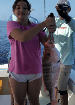 Maddie Fagg with a nice Red Snapper caught on the Gulf Coast