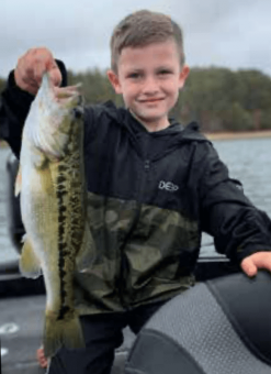 Tucker Winters with a nice spotted Bass he caught while fishing at Lake Hartwell in South Carolina
