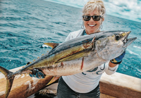 Stacey Johnson checked catching this 35 lb. tuna off her bucket list! Said she had a BLAST...and fillets for days!