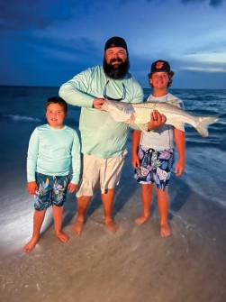 Some father-son fishing: Dane caught this snook in the surf off Holmes Beach (Isaiah, Dane, and Gabe Bragg).