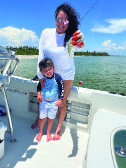 Raquel Gaudet and her son James Thomas in Boca Grand  caught some pin fish!