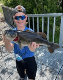 Gunner Wolf with a “Biggin” caught on a bread ball while fishing for bream in private pond