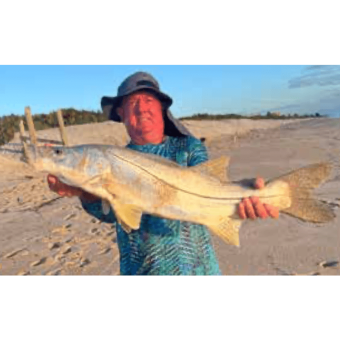 Wally Cheslock with a fat Snook he caught in Melbourne Beach