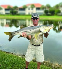 Mark Mongeon w/ a 36.5” beauty caught in an Estero freshwater pond.