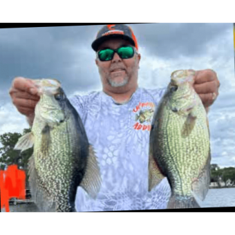 Owner of Crappie Addict Fishing Gear, Brian Harford with a pair of nice Crappie from the St Johns River System