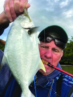 George Peters of Bonita Springs with a Pompano from the Wiggins Pass area.
