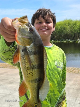 Jack and a Peacock Bass