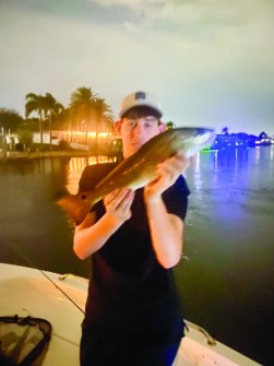 Ryan, 14, with a nice redfish in Cape Coral.