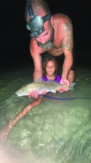 Summer-time fishing is good for Kioma R., shown w/ a nice 20” redfish.