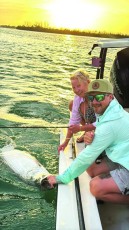 Tammy Collins caught her 1st tarpon w/the help of her friend Capt. Mark McFadden.