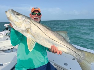 Alan w/ a beauty of a snook out w/ Capt. Chris.