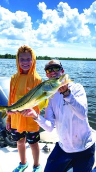 My son Brooks (6) catching a 27” snook with Capt. Peter Smith with Double Bounty Charters.