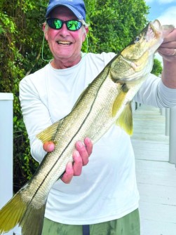 Hoosier Angler, Jay Heidenreich horses in monster snook like a true Boilermaker in Gasparilla Bay!