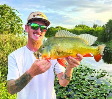 Kory Kio of North Fort Myers, FL w/ a nice peacock bass 4pounds.