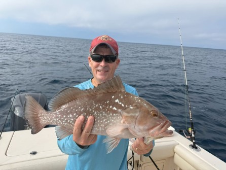 Mike Oxsmall w/ a nice red grouper, 105’ of water off Ft. Myers Christmas day.