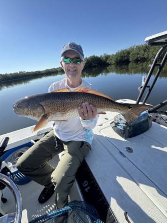 March Madness on Mega-Reds at Merritt Island, FL’s mangrove roots using mullet.