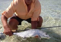 Photo of Darren Clarke and his catch of the day, a nice bonefish.